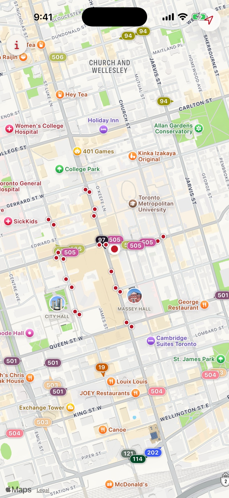 Live map of downtown Toronto with streetcars and buses shown in route colours
